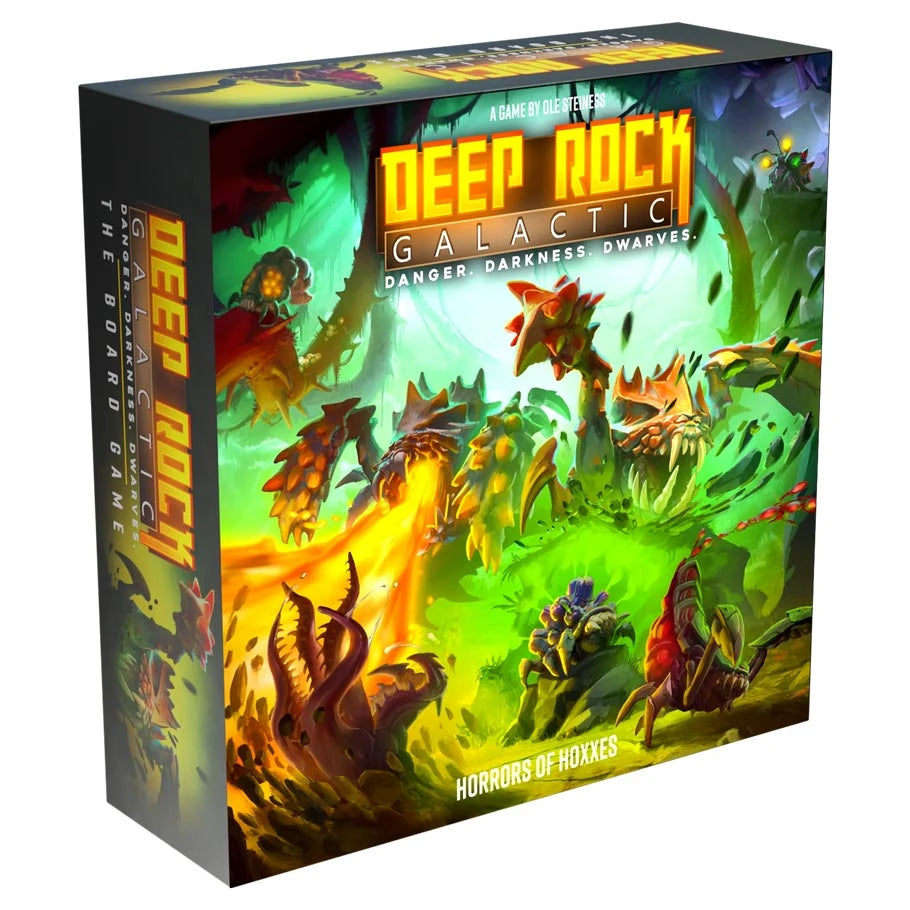 Deep Rock Galactic Horror of Hoxxes Expansion box art featuring colorful alien landscapes and creatures.