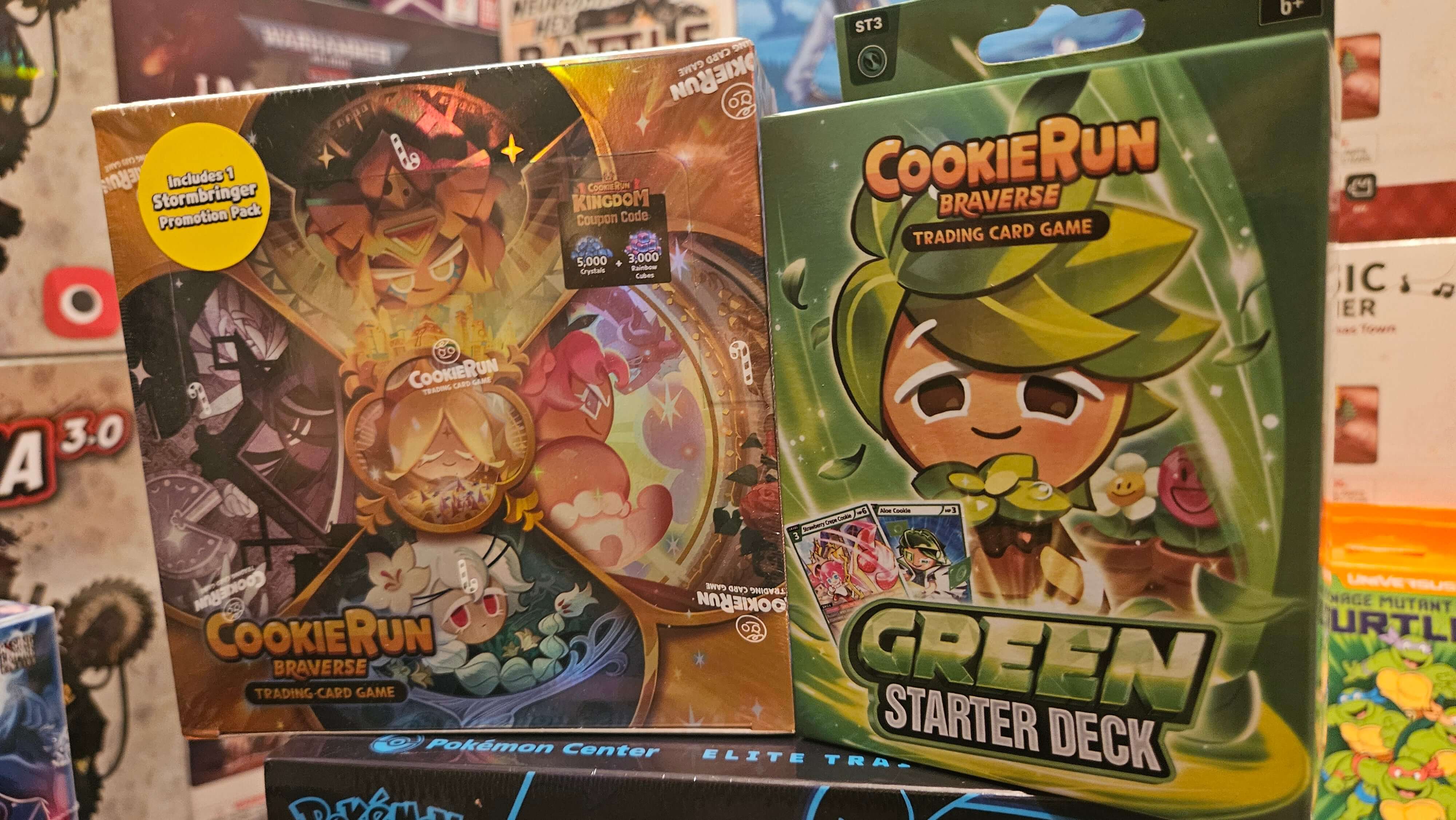 Cookie Run Starter Bundle - Choice of Starter Deck + Heroes & Kingdoms Booster Box displayed with Green Starter Deck.