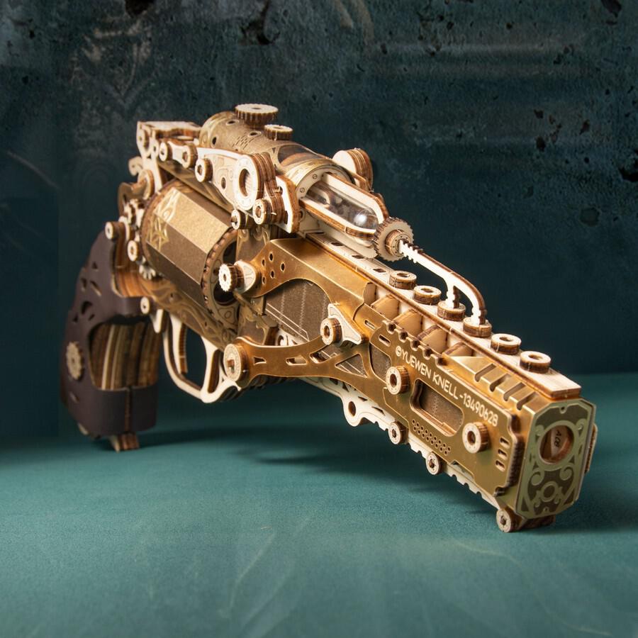 HowCat Steampunk Revolver Gold DIY 3D Wooden & Paper Puzzle detailed model with gold and brass design.