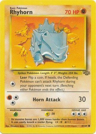 Rhyhorn (61/64) [Jungle Unlimited] card showcasing its HP, abilities, and combat stats against a vibrant background.