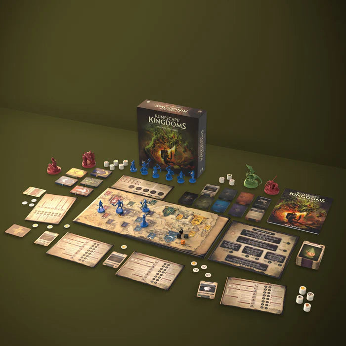 Unboxed contents of RuneScape Kingdoms board game including miniatures, cards, map tiles, tokens, and player boards