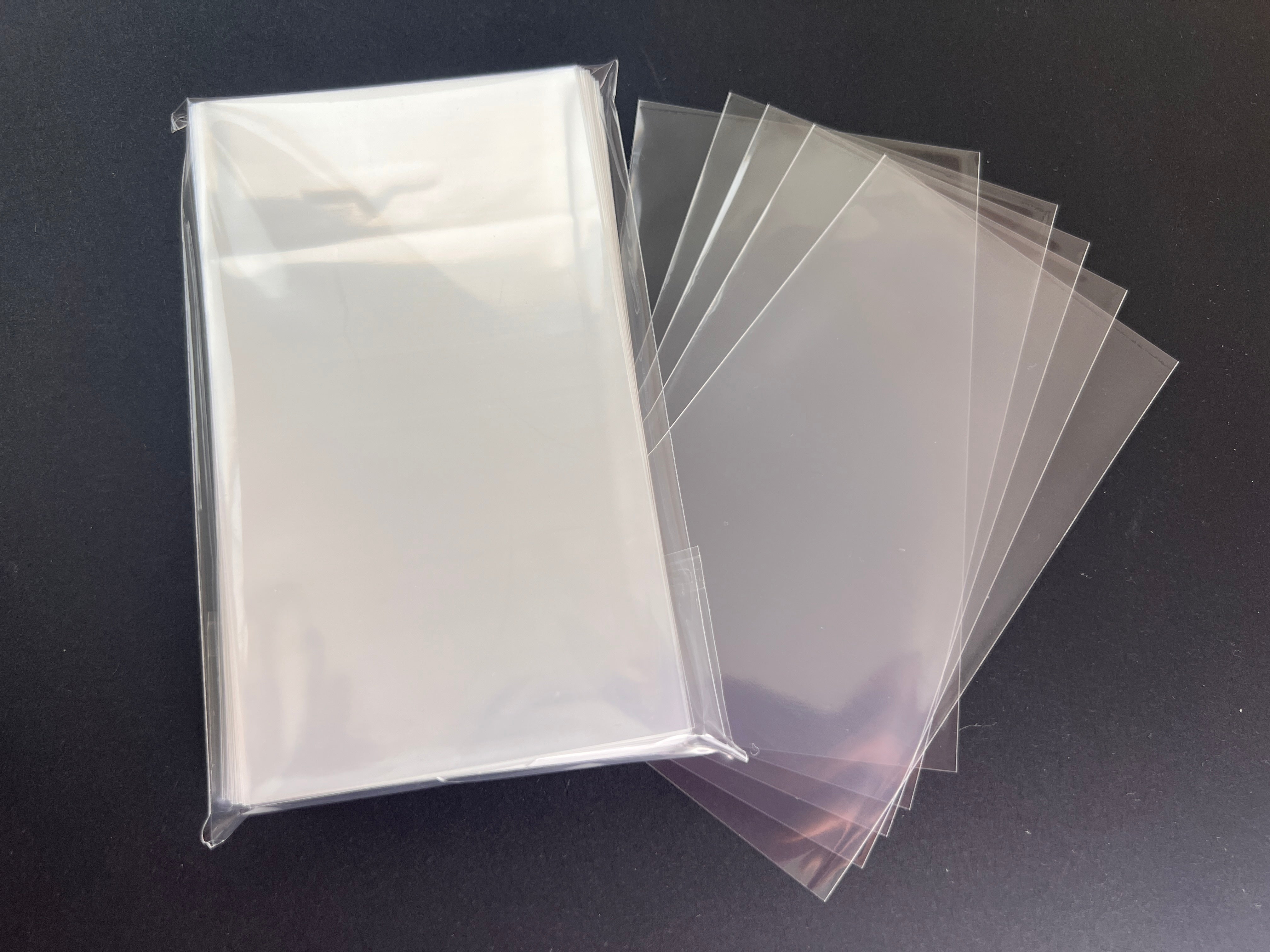 Space Alert Compatible Large Card Sleeves (67x103mm) 110 Pack, 60 Micron, SKS-8829 displayed in packaging with individual sleeves.